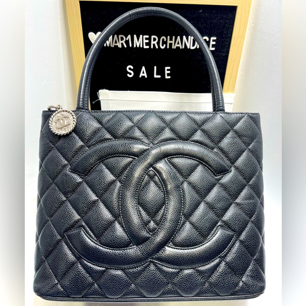 Chanel Medallion Tote Quilted Bag in Black Caviar and Silver Hardware.